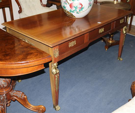 A French Empire style bureau plat with ormolu mounts, W.150cm